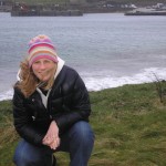 Catherine blowing off cobwebs on Clare Island