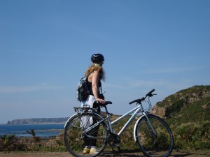 Catherine cycling between Corbiere and St Ouen, Jersey