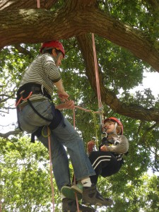 Catherine's husband and son treeclimbing with Goodleaf