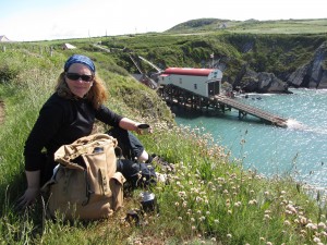 Catherine overlooking the lifeboat station and funicular at St Justinian's Bay, on the Pembrokeshire Coast Path