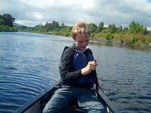Catherine's son canoeing on Caledonian Canal