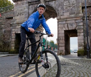 Lawrence McBride, founder Far and Wild on Derry-Londonderry's city walls Photo credit: Far and Wild